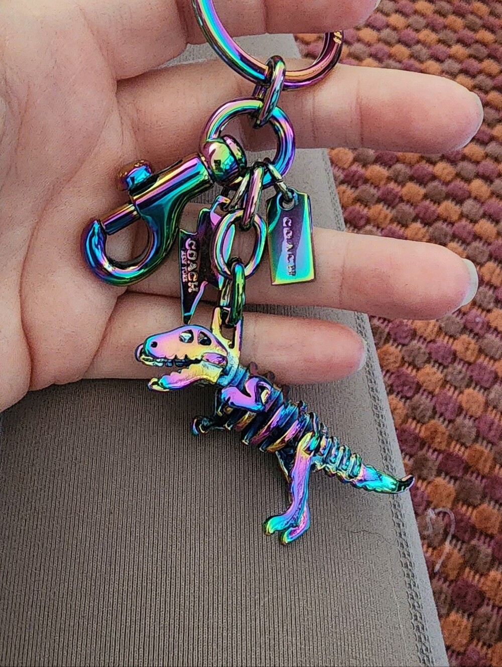 COACH Rexy Oil Slick Keychain